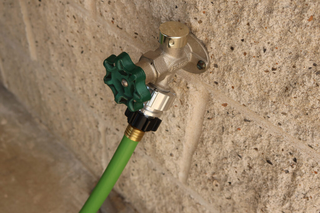 Hose Shark connector during pool deck wash