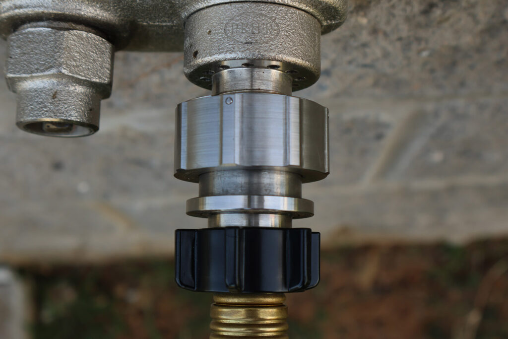 Hose Shark connector at greenhouse entrance